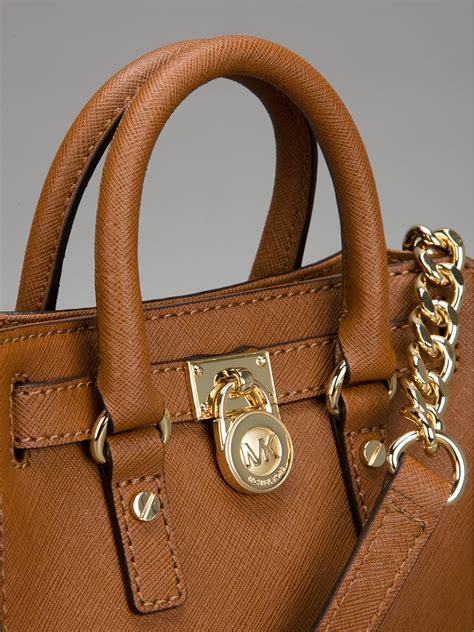 brown michael kors purses|michael kors brown shoulder bag.